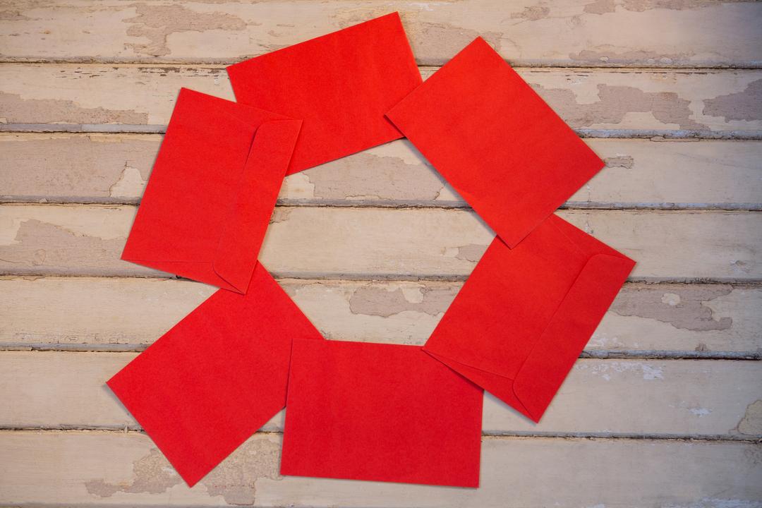 Red envelopes decorated on wooden plank - Free Images, Stock Photos and Pictures on Pikwizard.com