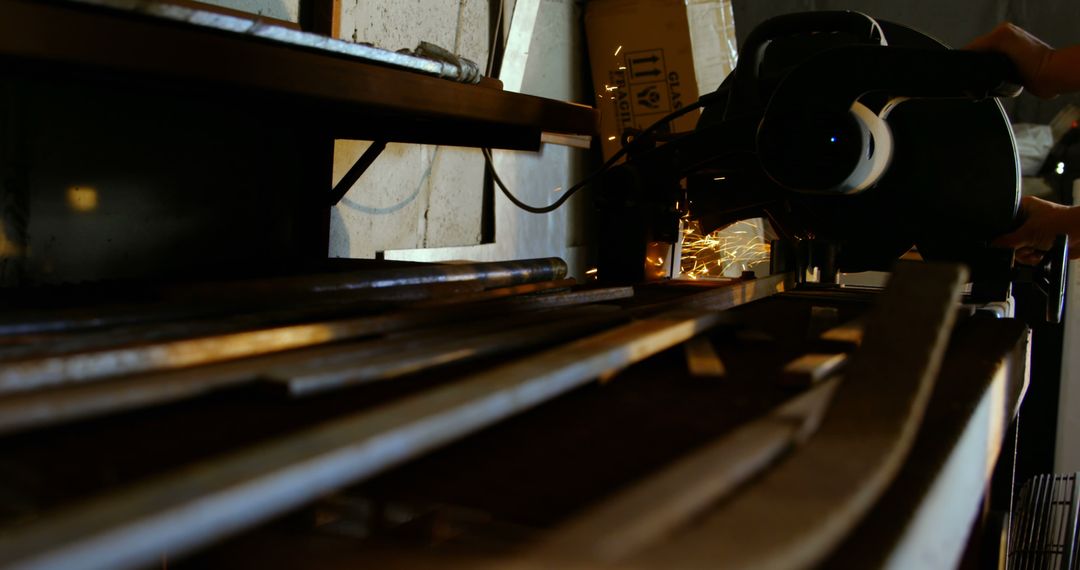 Industrial Worker Using Circular Saw for Precision Metal Cutting - Free Images, Stock Photos and Pictures on Pikwizard.com