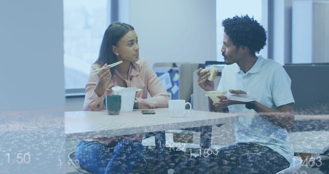 Coworkers Discussing Over Lunch in Modern Office Break Room
