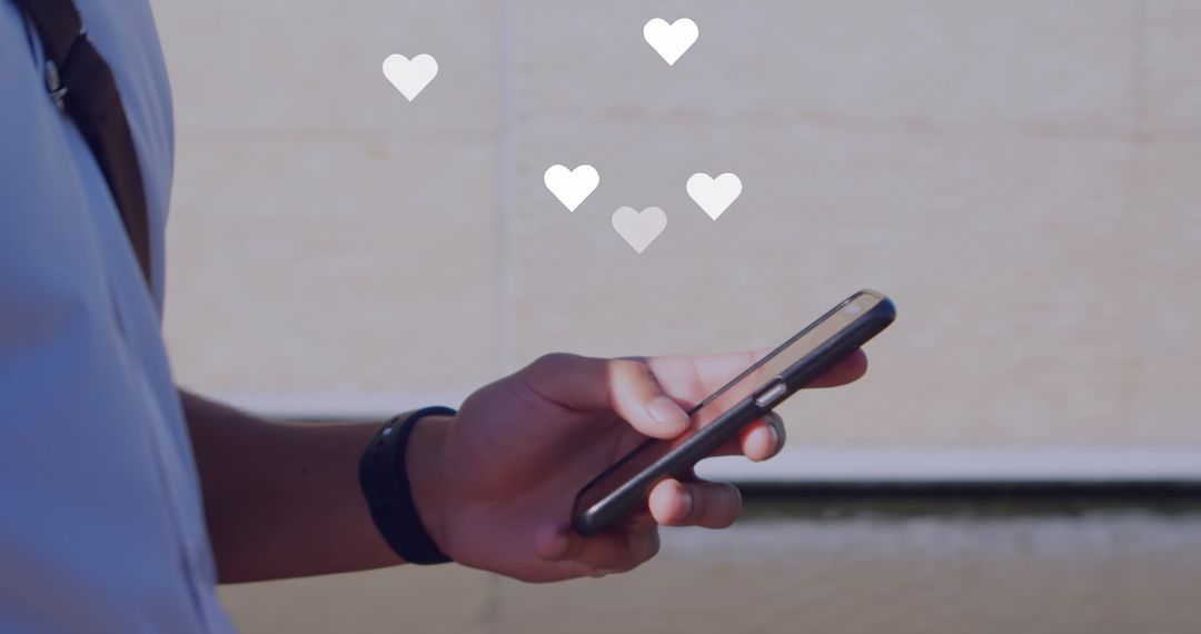 Midsection of Man Using Smartphone with Social Media Reaction Icons