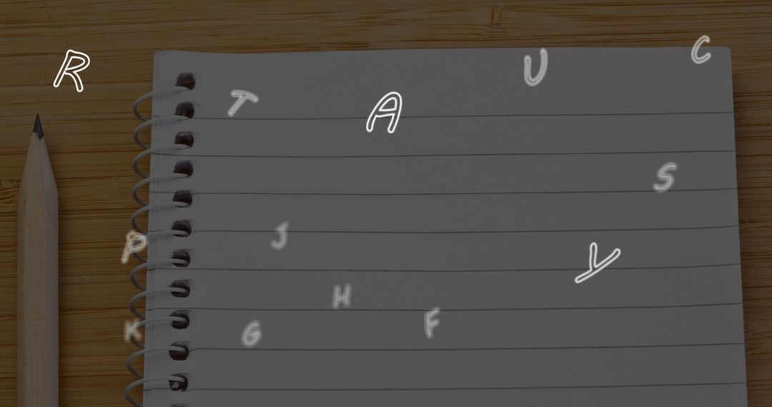 Evolving letters over ruled notebook and pencil