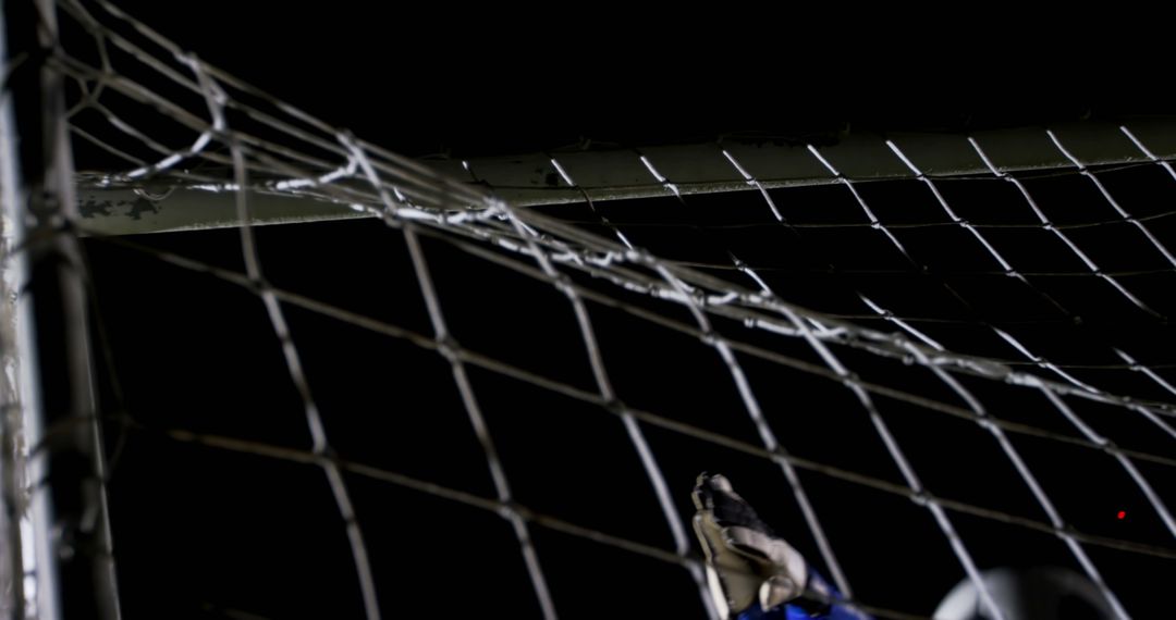 Soccer Ball in Goal Post with Goalkeeper on Green Playing Field - Free Images, Stock Photos and Pictures on Pikwizard.com