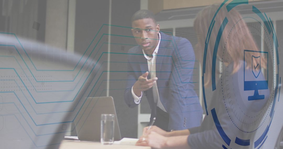 Confident Businessman Discussing Tech Strategy in Modern Office