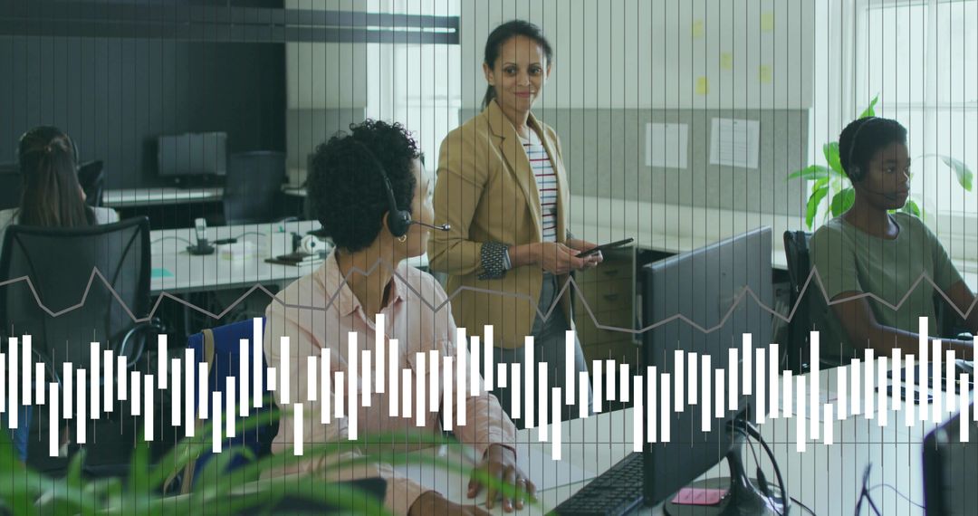 Teamwork in Modern Office with Mid-Aged Female Leader Engaging in Presentation