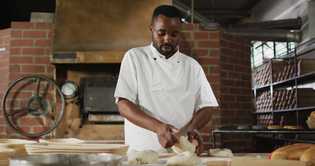 African American Baker Prepping Dough in Rustic Bakery - Free Images, Stock Photos and Pictures on Pikwizard.com