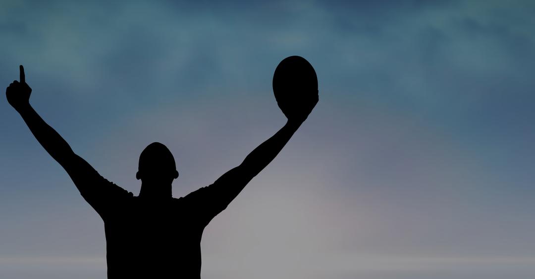 Silhouette man with arms raised holding rugby ball - Free Images, Stock Photos and Pictures on Pikwizard.com