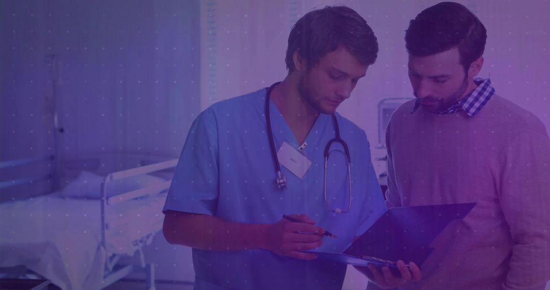 Medical Practitioner Consulting with Patient Using Chart in Hospital Ward