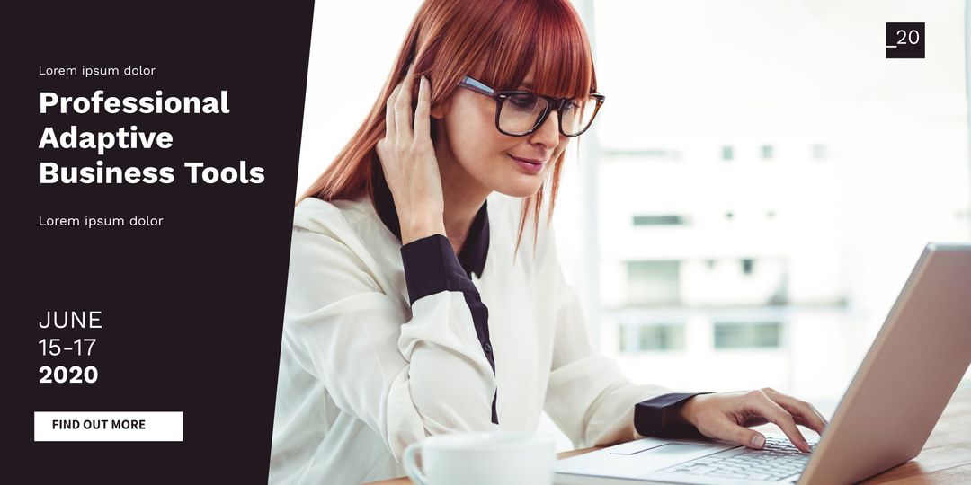 Focused Professional Woman Using Laptop for Business Tools