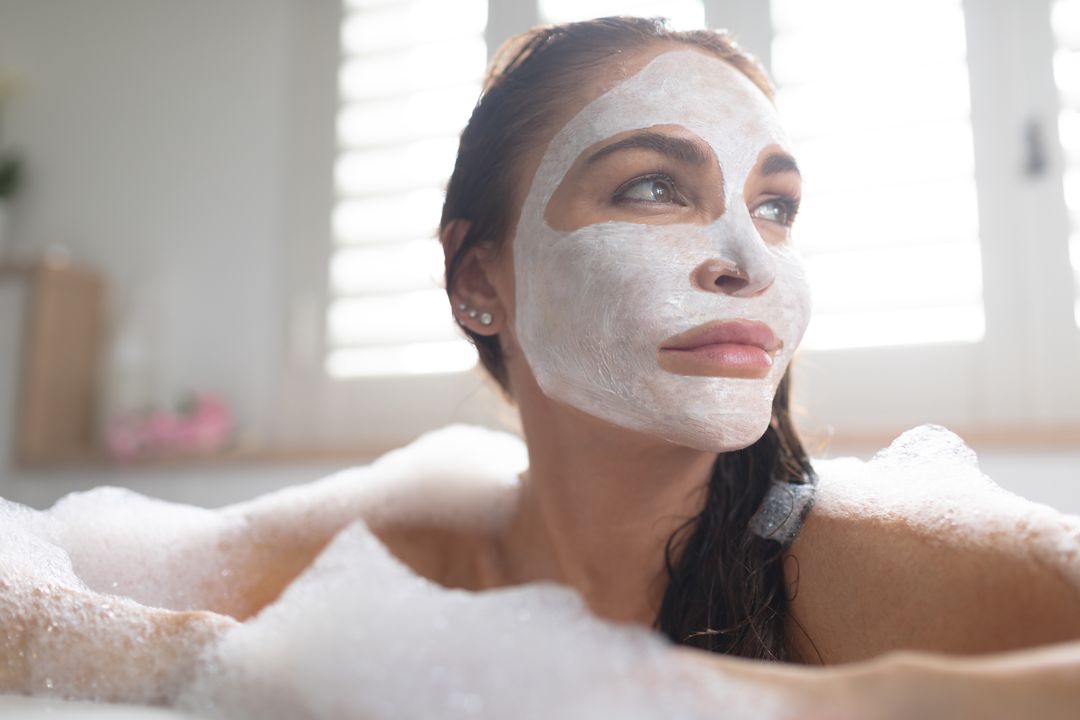 Relaxed Woman with Face Mask in Bathtub - Free Images, Stock Photos and Pictures on Pikwizard.com