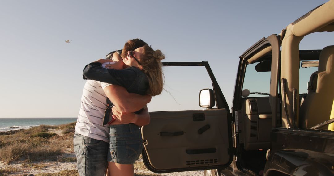 Couple Embracing Near Open Car Door On Beach - Free Images, Stock Photos and Pictures on Pikwizard.com