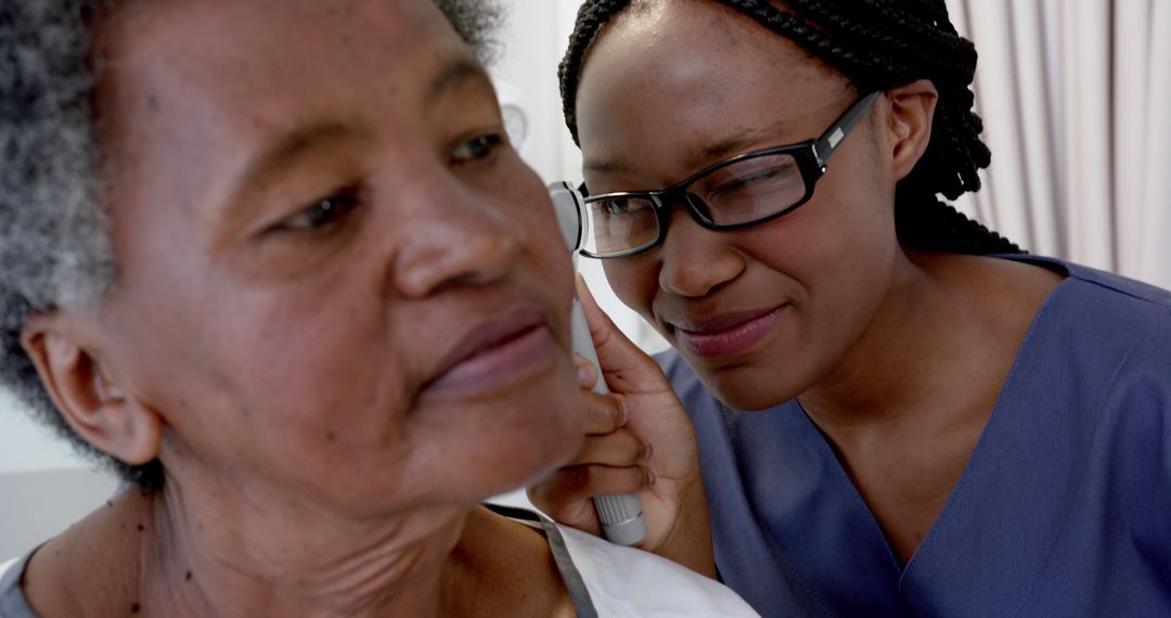 Nurse Checking Senior Woman's Ear in Medical Exam - Free Images, Stock Photos and Pictures on Pikwizard.com