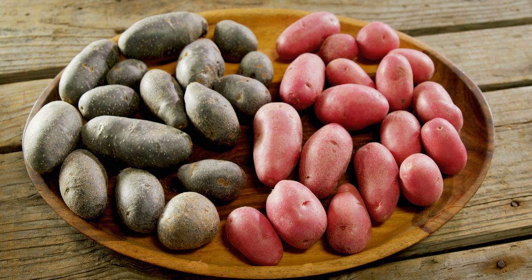 Variety of Potatoes on Wooden Plate - Free Images, Stock Photos and Pictures on Pikwizard.com