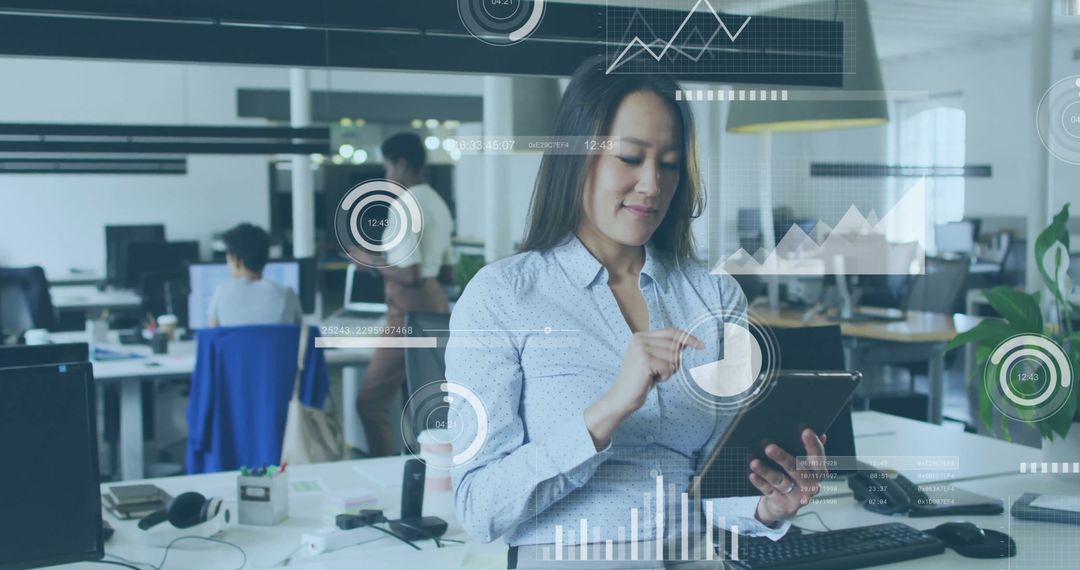 Businesswoman Using Tablet with Digital Financial Interface Overlays