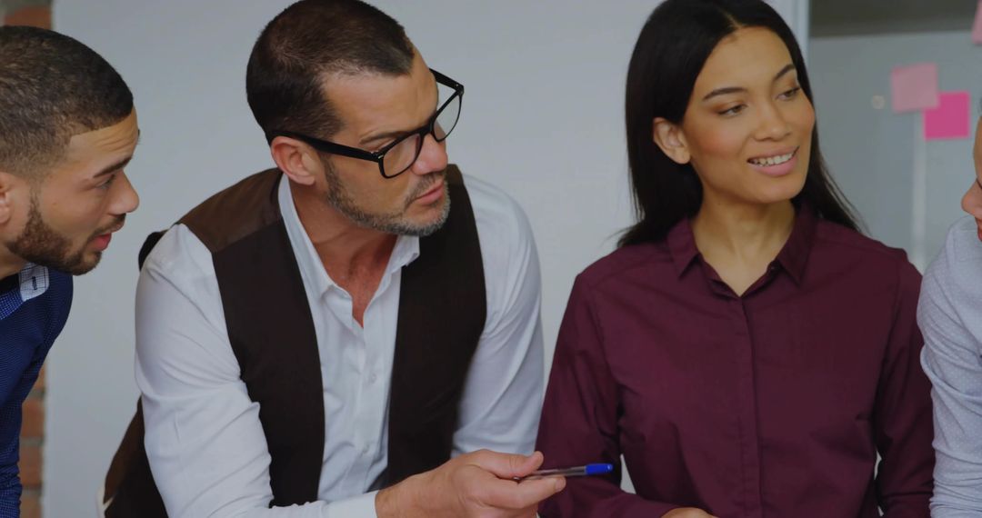 Diverse Team Collaborating During Creative Brainstorming Meeting