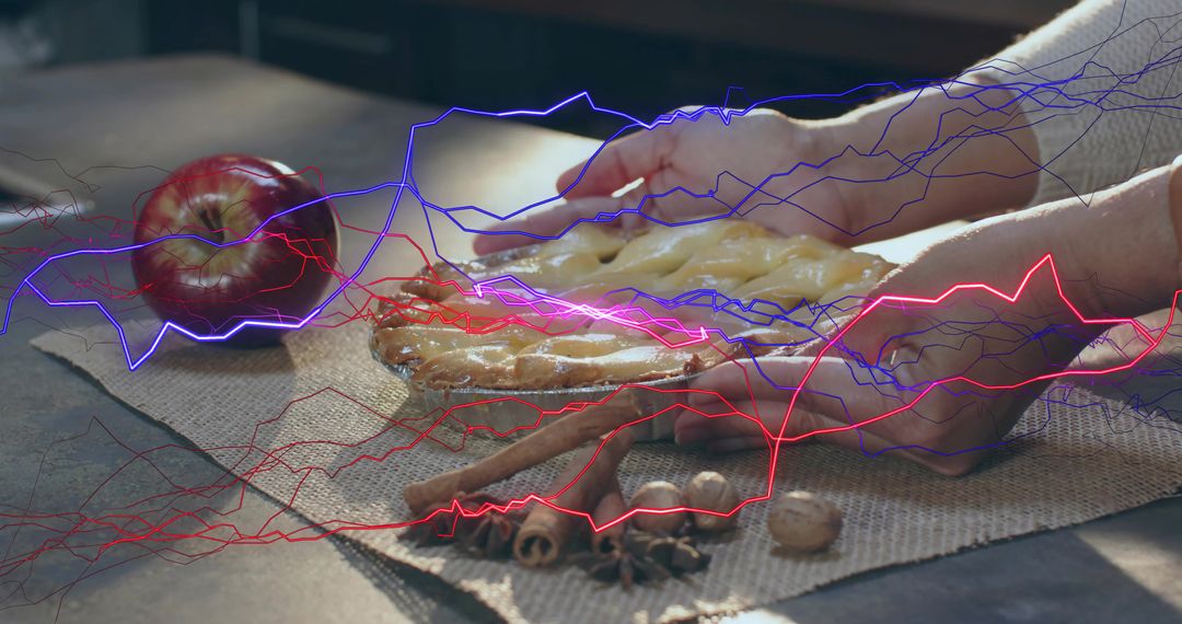 Senior Hands Pressing Lattice Apple Pie on Burlap with Neon Light Trails