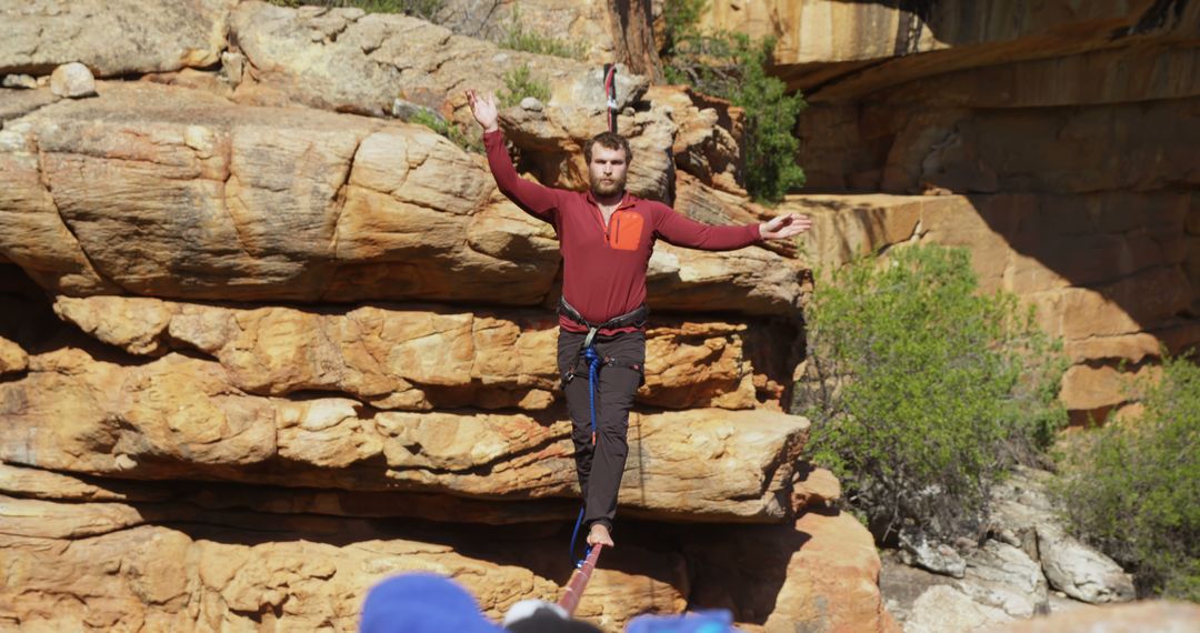 Man Balancing on Tightrope Across Canyon - Free Images, Stock Photos and Pictures on Pikwizard.com