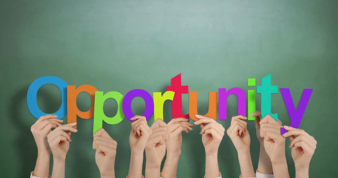 Hands Raise Colorful Letters Forming 'Opportunity' on Green
