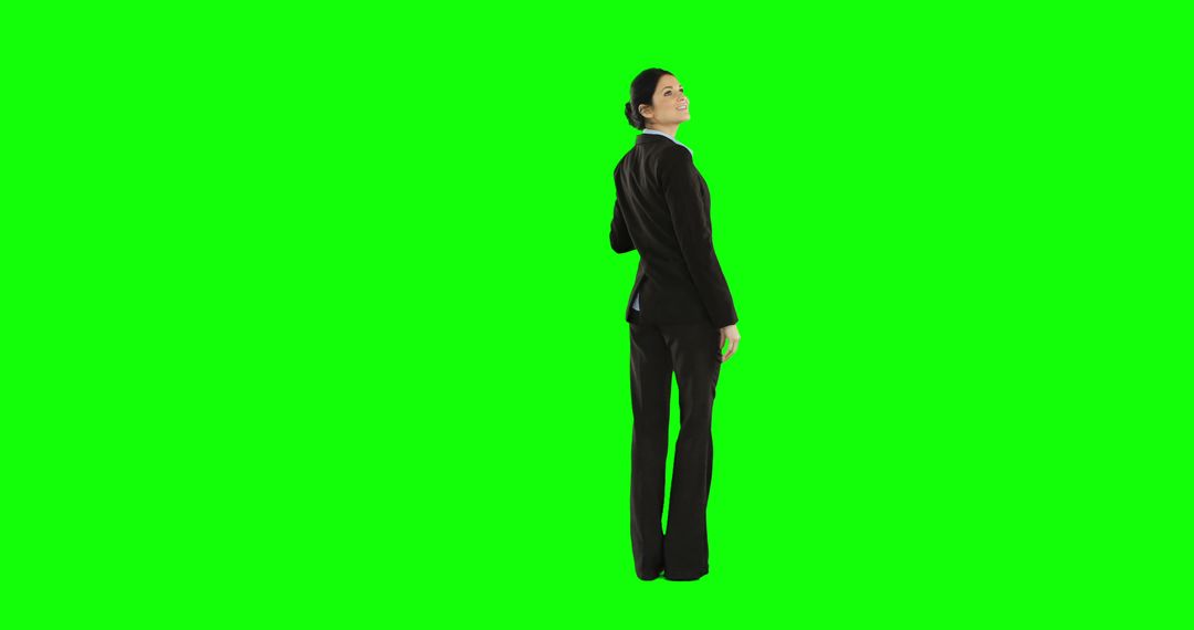 Businesswoman Standing in Formal Suit on Green Screen Background - Free Images, Stock Photos and Pictures on Pikwizard.com