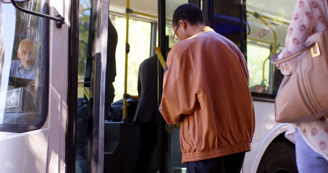 Passengers Boarding City Bus Under Bright Sunlight - Free Images, Stock Photos and Pictures on Pikwizard.com