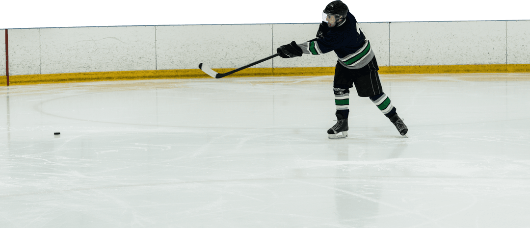Caucasian Hockey Player Focused on Ice for Transparent Backgrounds