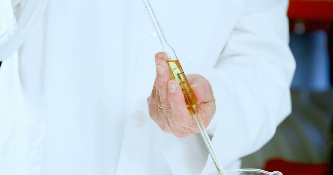 Scientist Performing Liquid Chemical Analysis in Laboratory - Free Images, Stock Photos and Pictures on Pikwizard.com