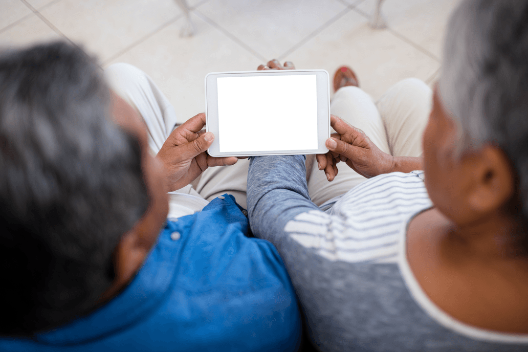 Senior Couple Modern Technology Concept with Transparent Tablet Blank Screen