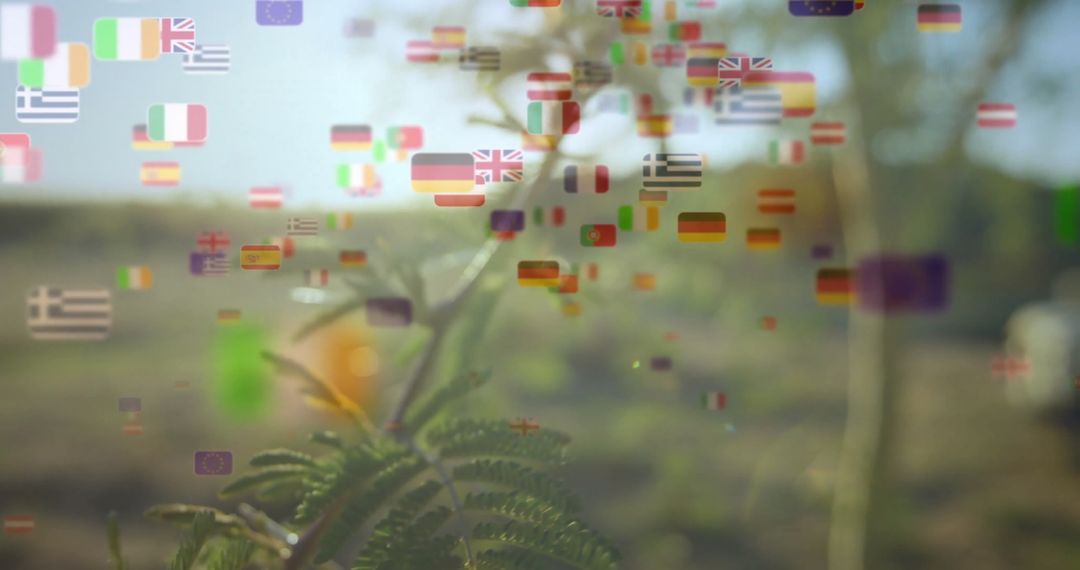 Shimmering Plant with Floating International Flags in Sunlit Field