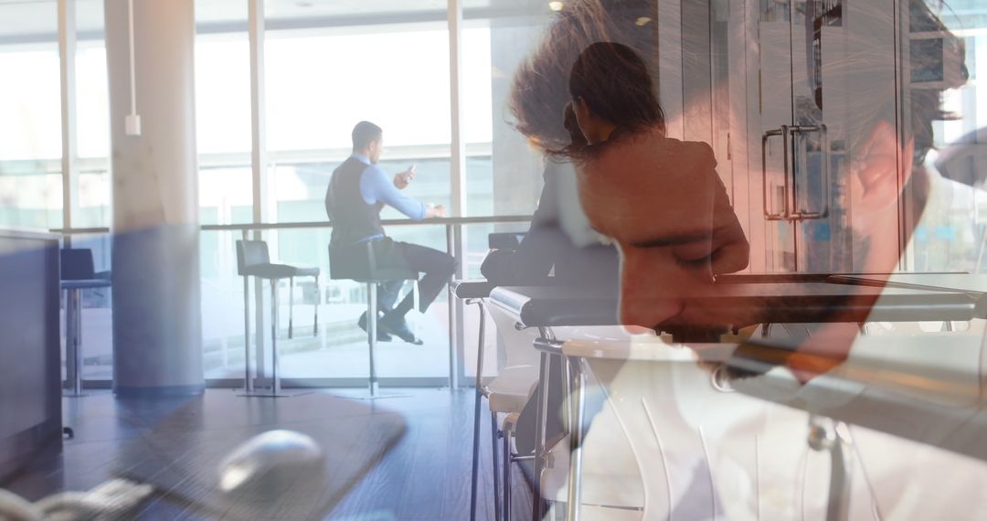 Caucasian Businessman Multitasking in Modern Mixed Workspace