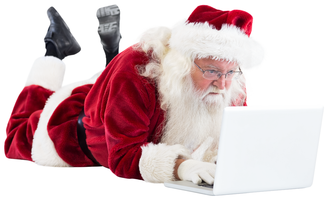 Transparent Santa Claus Using Laptop On Floor With Focused Expression - Download Free Stock Images Pikwizard.com