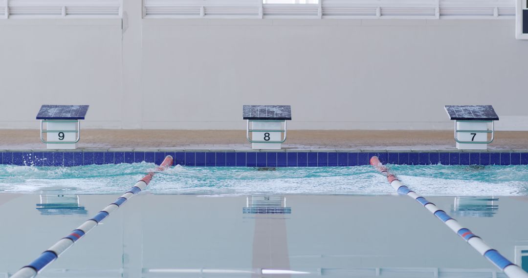 Indoor Swimming Pool with Empty Lanes for Recreational Sports - Free Images, Stock Photos and Pictures on Pikwizard.com