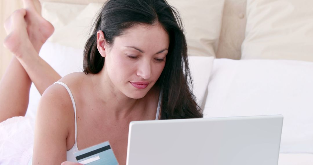 Woman Shopping Online with Credit Card in Bed - Free Images, Stock Photos and Pictures on Pikwizard.com