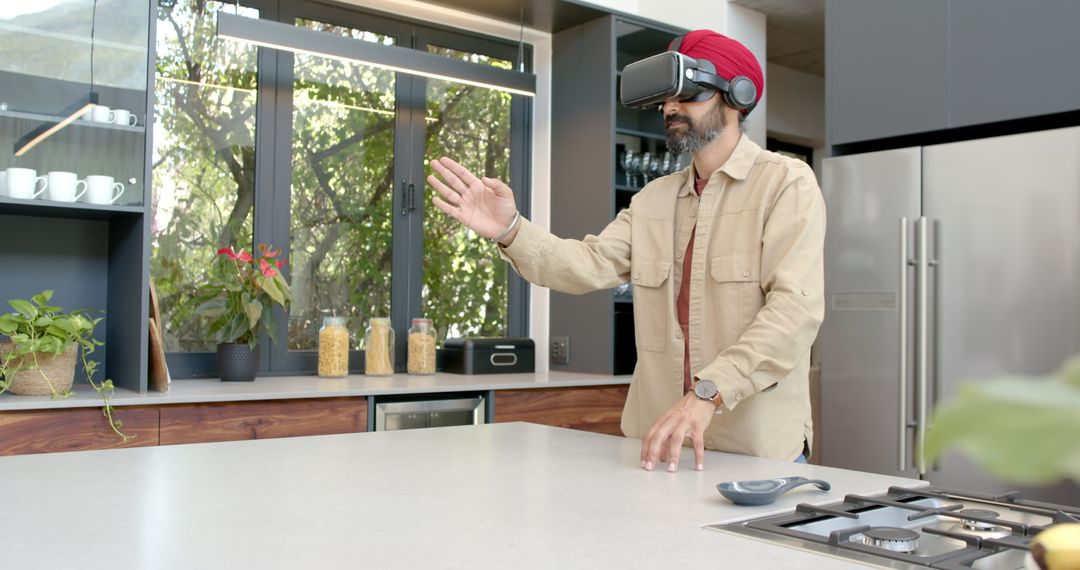 Man Exploring Virtual Reality in Modern Kitchen Space