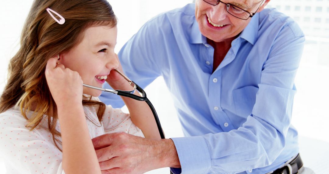 Grandparent and Child Playing Doctor with Stethoscope in Bright Room - Free Images, Stock Photos and Pictures on Pikwizard.com