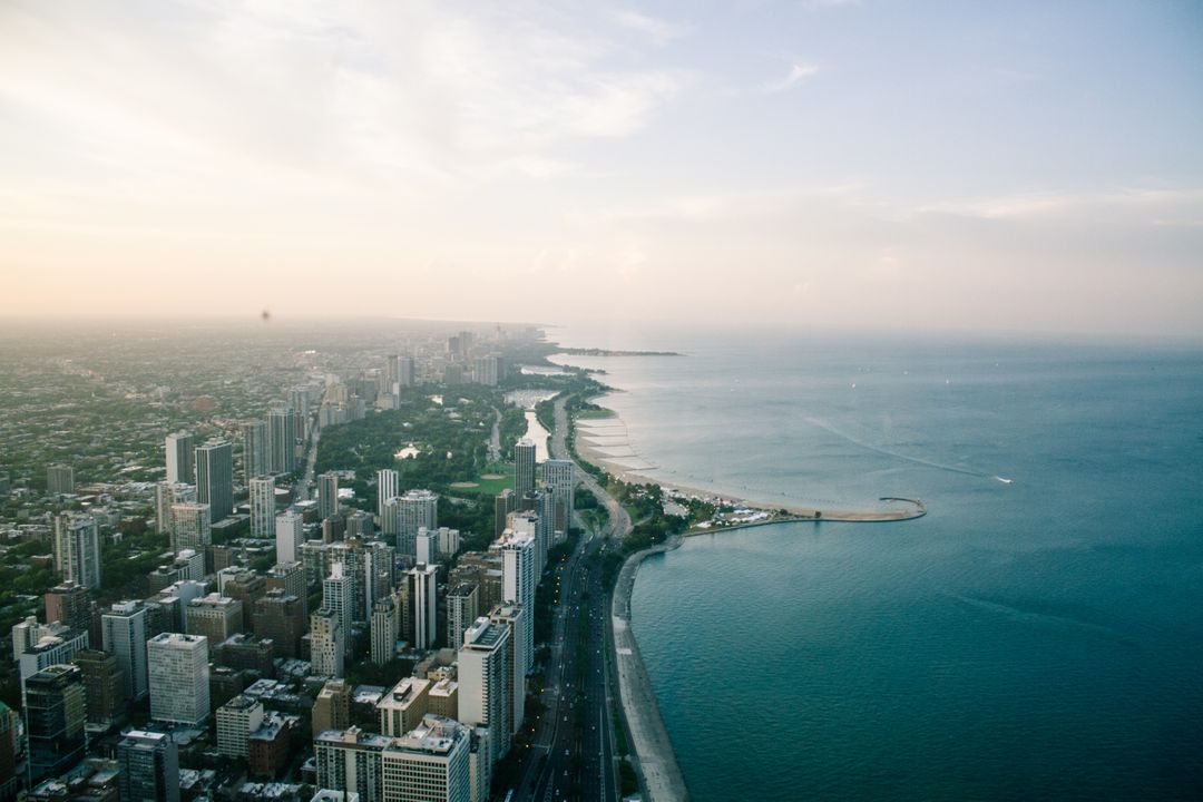 Aerial View of Urban Coastal Cityscape at Sunrise - Free Images, Stock Photos and Pictures on Pikwizard.com