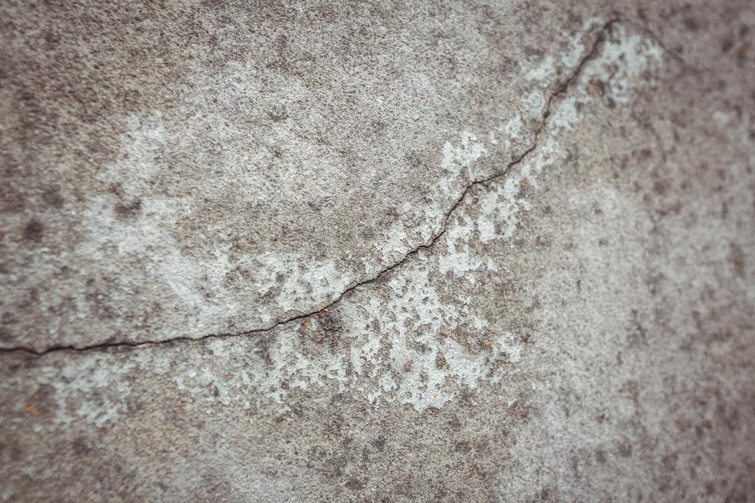 Close-Up of Weathered Concrete Wall with Crack - Free Images, Stock Photos and Pictures on Pikwizard.com