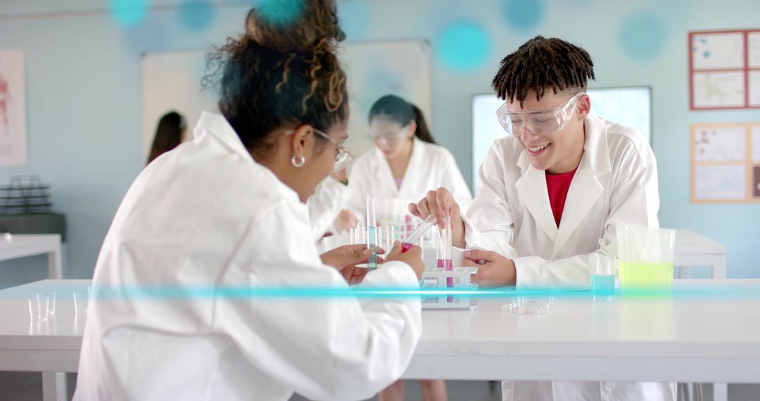 High School Students Conducting Colorful Chemistry Experiment in Modern Science Lab