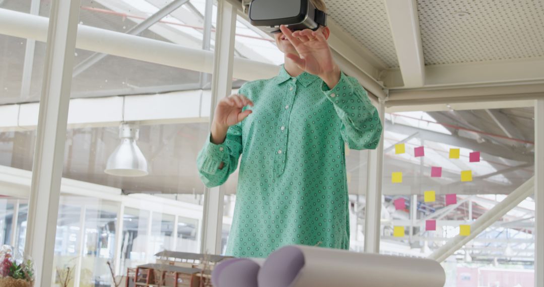 Designer Using Virtual Reality Headset in Modern Office - Free Images, Stock Photos and Pictures on Pikwizard.com