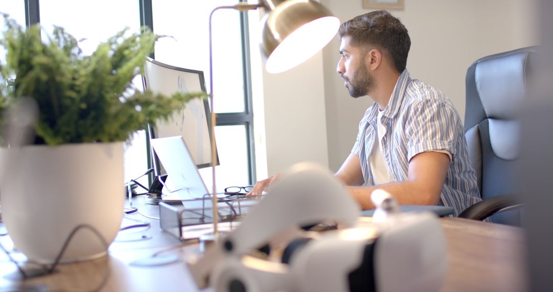 Modern Professional Man Working in Office with VR Technology