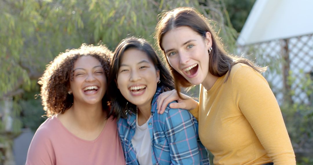 Diverse Female Friends Laughing Together Outdoors