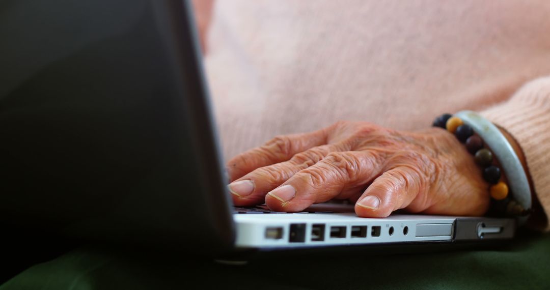 Elderly Hands Typing on Laptop Keyboard - Free Images, Stock Photos and Pictures on Pikwizard.com