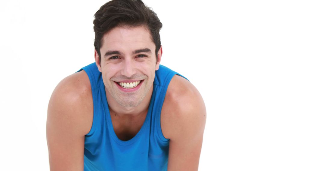 Smiling Man in Blue Tank Top With White Background - Free Images, Stock Photos and Pictures on Pikwizard.com