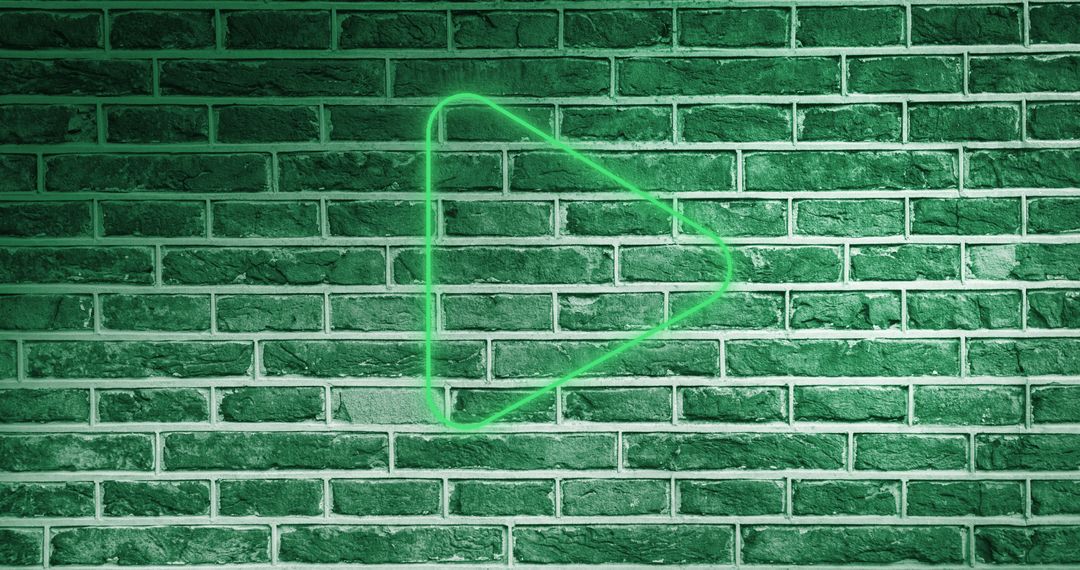 Glowing Neon Arrow Icon on Green Brick Wall
