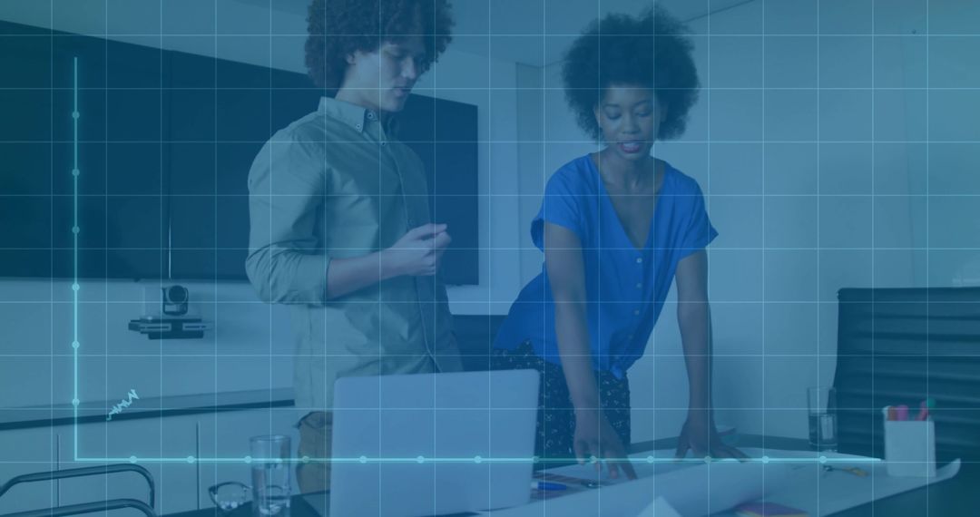 Team Analyzing Business Data in Modern Boardroom