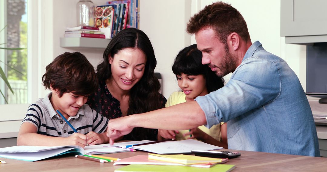 Parents Encouraging Children with Homework at Kitchen Table - Free Images, Stock Photos and Pictures on Pikwizard.com