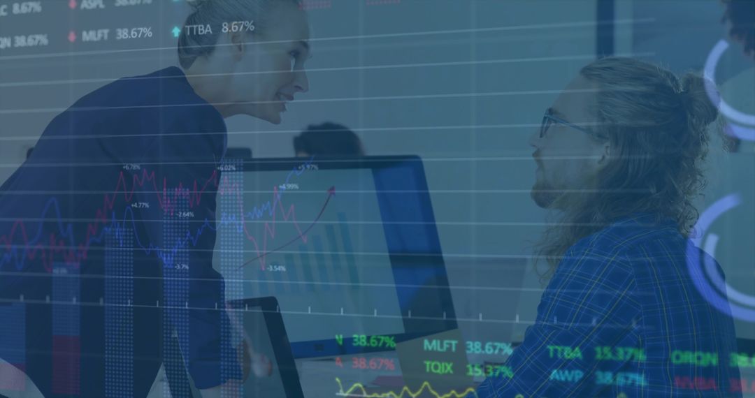 Colleagues Analyzing Stock Market Trends in Office