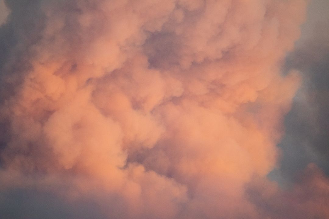 Soft Pastel Colored Cloud in Late Evening Sky