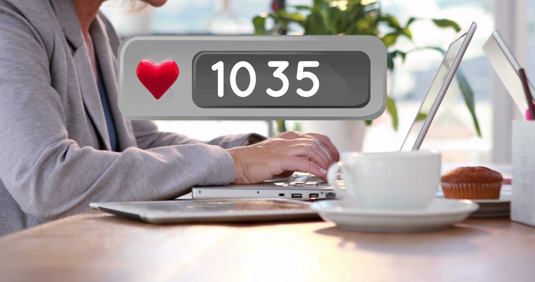 People Working on Laptops with Like Counter Increasing