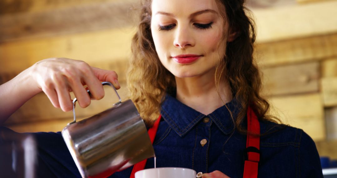 Barista Preparing Fresh Coffee with Focused Expression - Free Images, Stock Photos and Pictures on Pikwizard.com