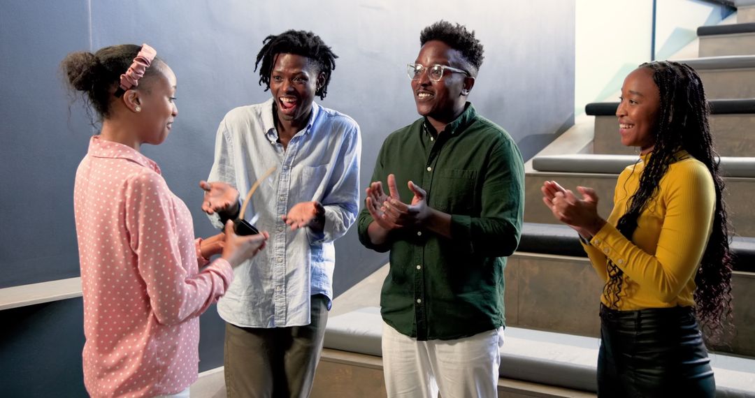 Diverse Colleagues Collaboration in Modern Office Environment