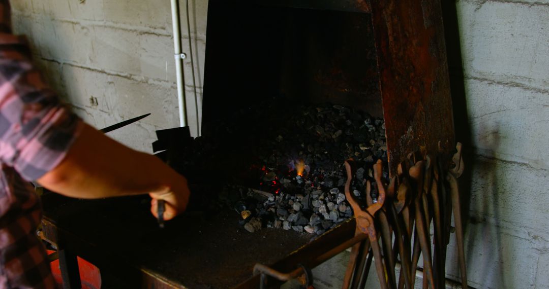 Blacksmith Working at Forge Station in Workshop - Free Images, Stock Photos and Pictures on Pikwizard.com